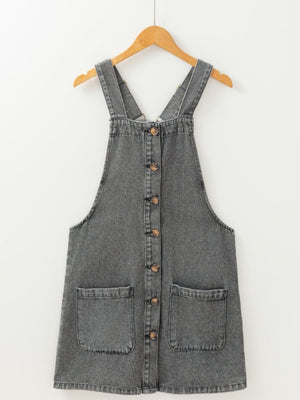 Gray faded denim pinafore dress with button front and two large front pockets.