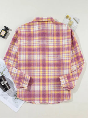 Oversized plaid shacket with classic collar and curved hem in pink, yellow, and white plaid.