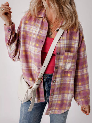 Oversized pink plaid shacket with pocket, button-down front, and classic collar.