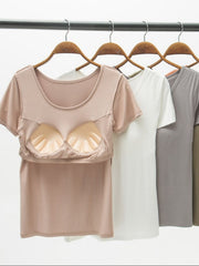Built-in bra scoop neck tee in dusty pink with padded cups, short sleeves, and a casual fit.