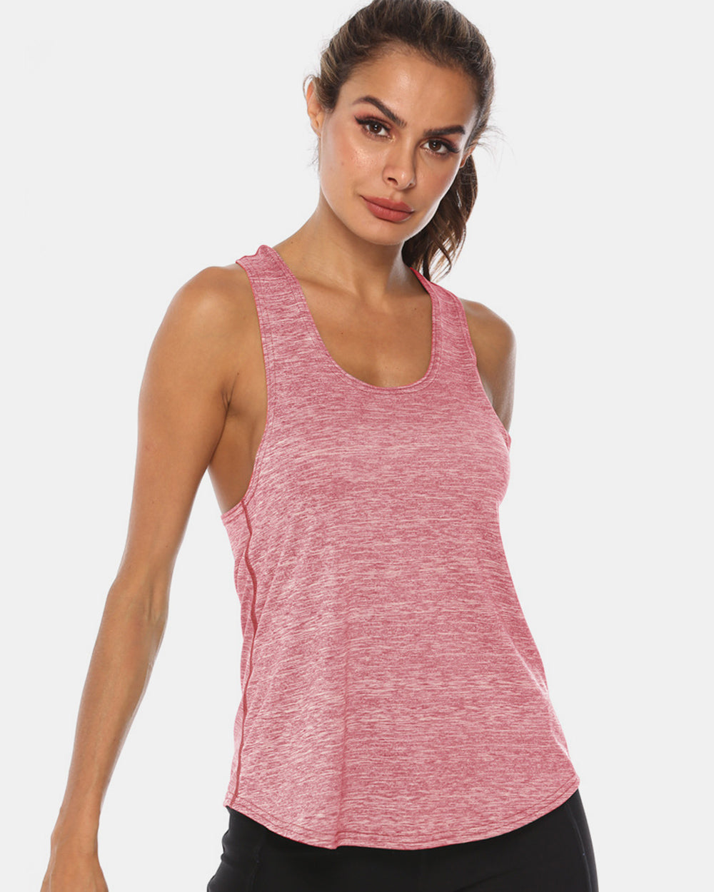 Racerback performance tank top in heathered blush pink with a scoop neckline.