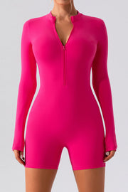 Hot Pink performance romper with zip detail, long sleeves, and short legs.