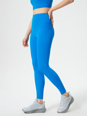Blue high-waisted sculpted contour leggings with seam detail and pocket.