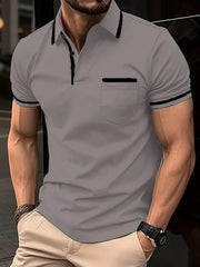 Gray short sleeve polo with black contrast trim on collar, pocket, and sleeves.