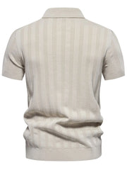 Beige ribbed knit polo shirt with vertical texture detail and short sleeves.