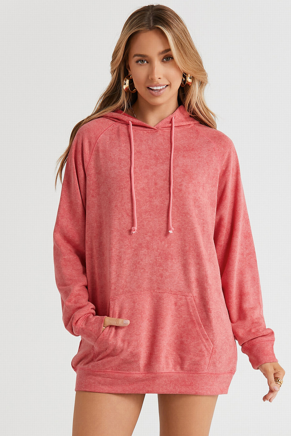 Coral textured raglan sleeve hoodie with drawstring and front pocket.
