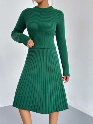 Green ribbed knit fit-and-flare co-ord set with long sleeves and A-line skirt.