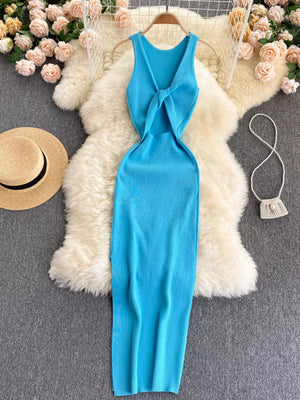 Light blue ribbed knit midi dress with knot-back cutout detail