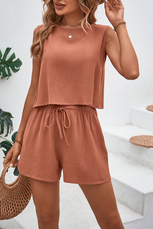 Textured crop top and shorts co-ord set in black with adjustable drawstring.