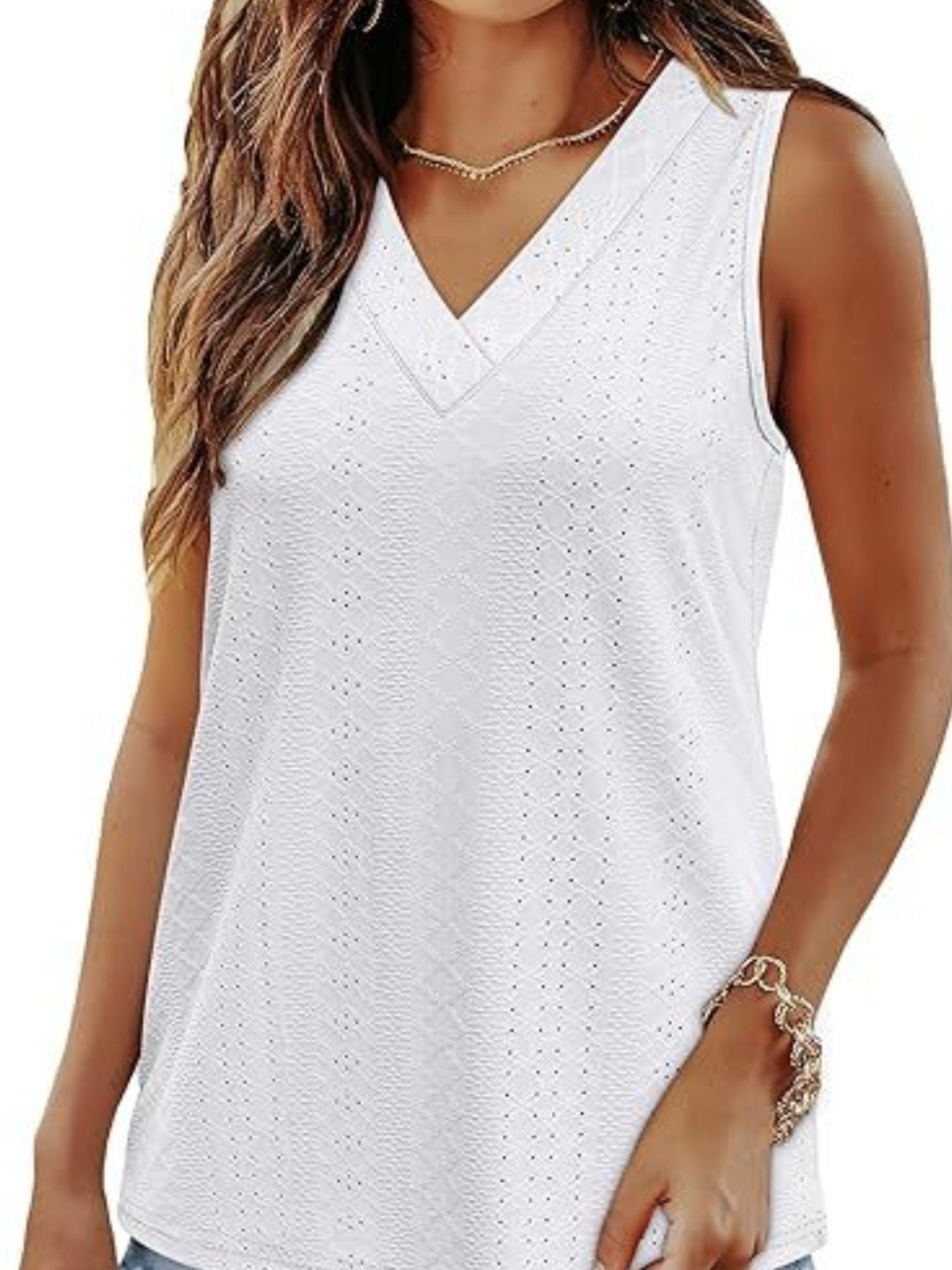 White eyelet V-neck sleeveless tank top with a textured pattern.