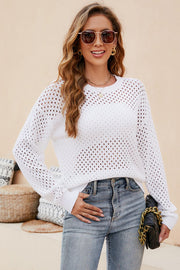 White open-knit crewneck sweater with subtle texture and long sleeves.