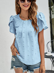 Blue textured puff sleeve blouse with dot pattern and pleated front.