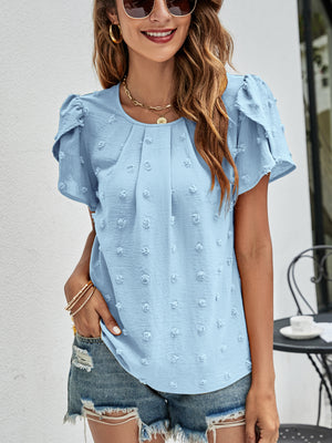 Blue textured puff sleeve blouse with dot pattern and pleated front.