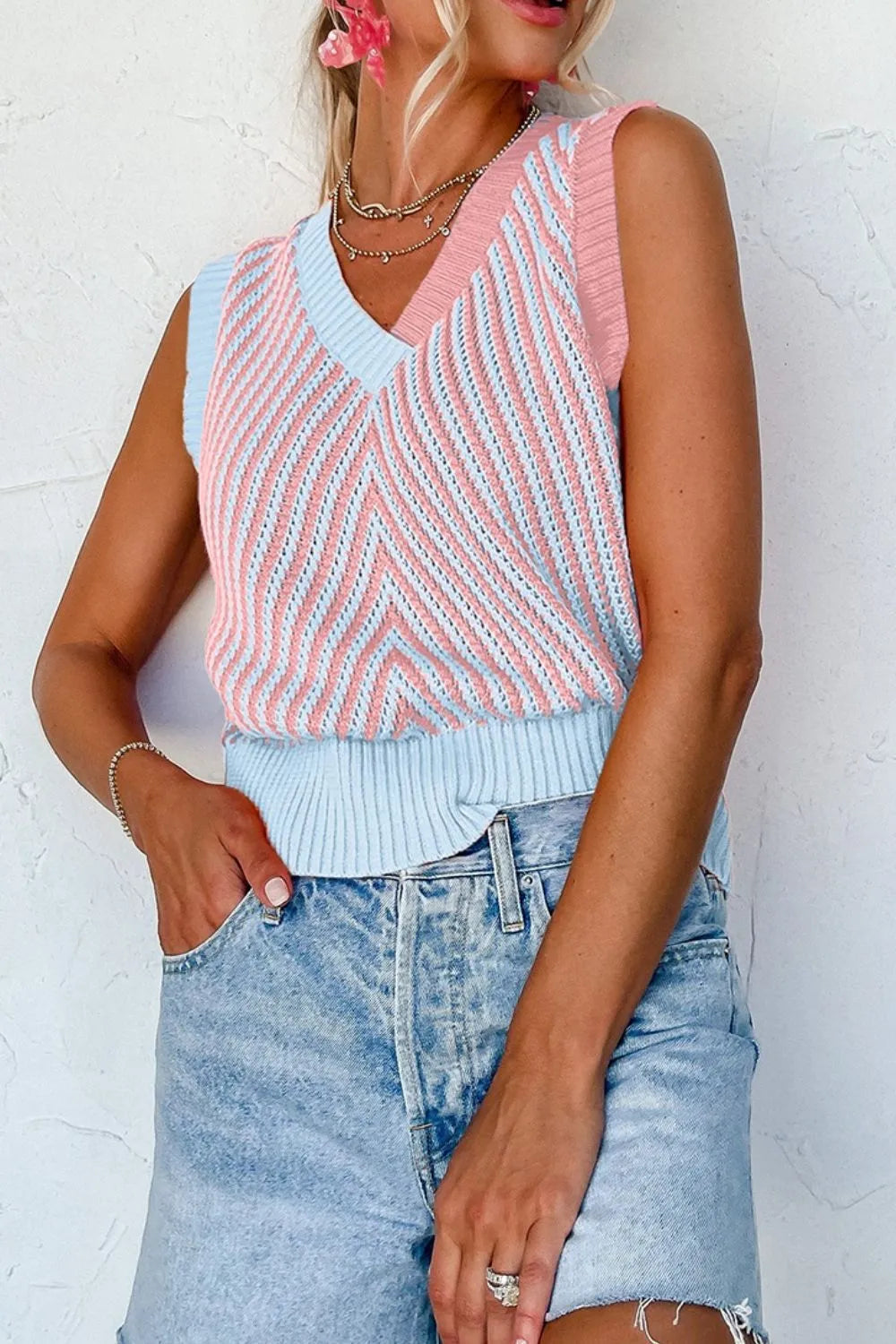 Chic Vibe Sweater Vest in blush pink and light blue with chevron pattern and V-neck.