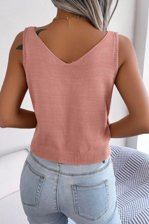 Dusty pink cable knit button-down tank top with V-neck and ribbed hem.