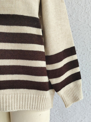 Horizontal stripe ribbed knit sweater in mocha and cream acrylic with banded sleeves.