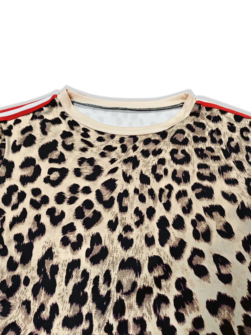 Leopard print maternity one-piece swimsuit in tan with red and white striped trim.