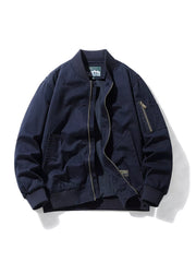 Plus-size navy blue cotton bomber jacket with zip-up front and zippered sleeve pocket.