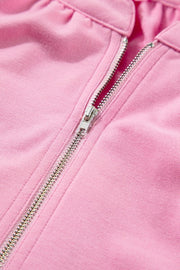 Pink cotton zip-up co-ord set with ruffled neckline detail