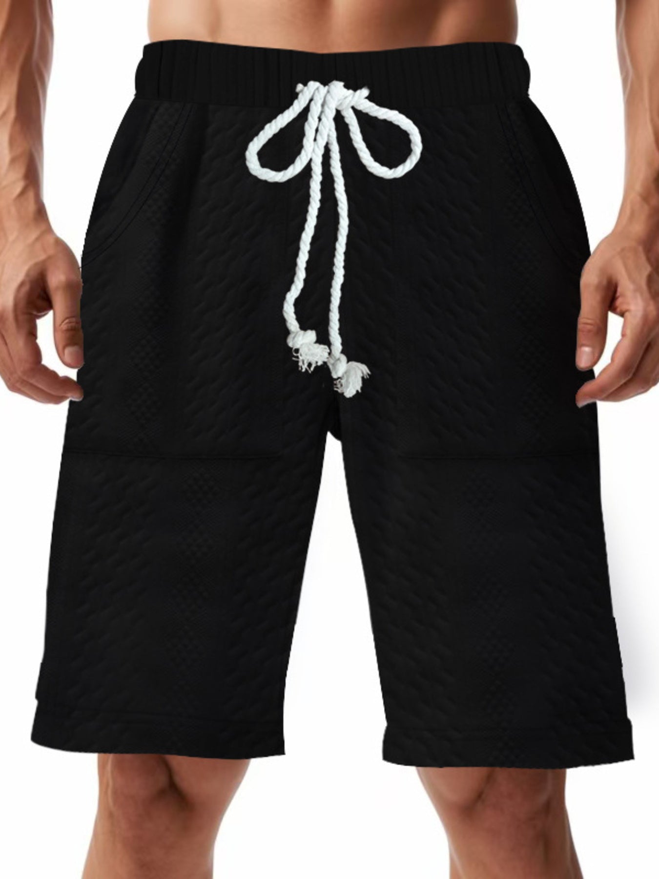 Black quilted texture drawstring men's chino shorts with diamond pattern.