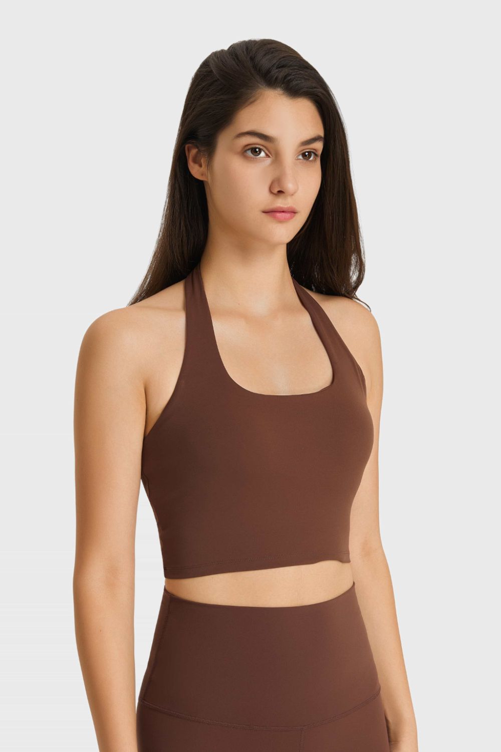 Brown halter neck sports bra with ruched back detail