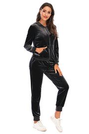Velvet loungewear set in charcoal with zip-up hoodie and jogger pants.