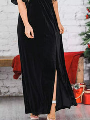 Black velvet maxi dress with flutter sleeves and high slit