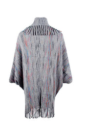 Textured knit cape in charcoal with colorful stripes and fringe trim at neckline and hem.