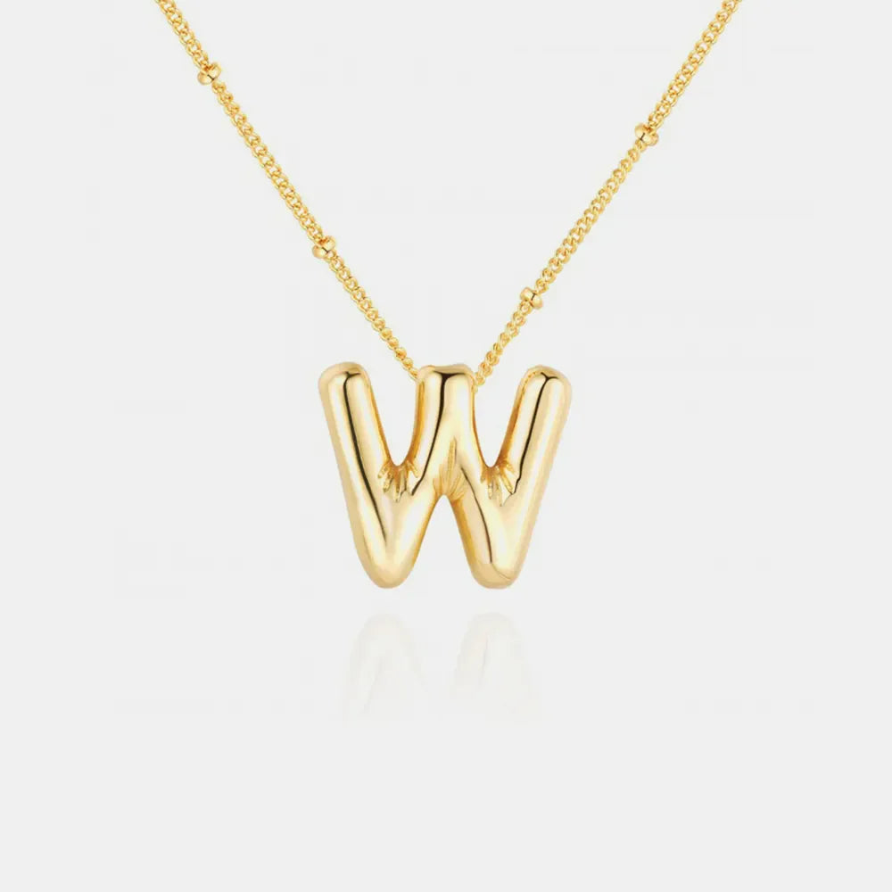 Gold initial necklace with bubbly letter W charm and beaded chain