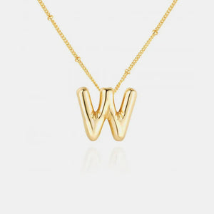 Gold initial necklace with bubbly letter W charm and beaded chain