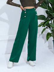 Dark green wide-leg trousers with gold button details on the waist