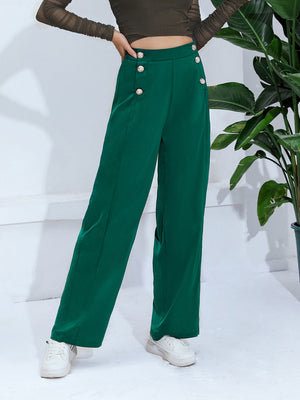 Dark green wide-leg trousers with gold button details on the waist