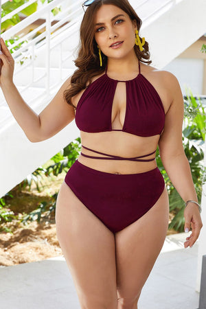 Burgundy halter bikini with keyhole cutout top and high-waist bottoms.