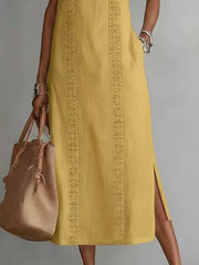 Yellow sleeveless midi dress with geometric trim and pockets