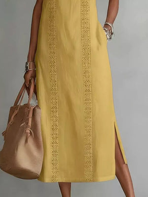 Yellow sleeveless midi dress with geometric trim and pockets
