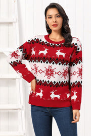 Red acrylic sweater with reindeer and snowflake Fair Isle pattern, crew neck, long sleeves.