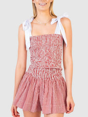 Strawberry smocked bodice and skirt set with tie straps and vertical stripe pattern.