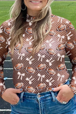 Brown sheer long sleeve t-shirt with football and bow print, high neck