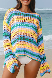 Striped crochet beach cover-up with a boat neck and long sleeves in multicolor stripes.