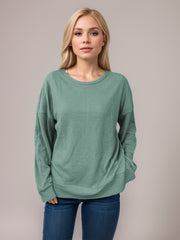 Waffle knit relaxed fit crewneck top in Gum Leaf green with long sleeves and a rounded hem.