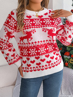 White acrylic sweater with red reindeer, snowflake, and heart jacquard pattern.