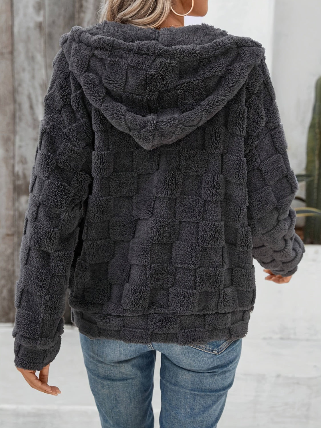 Dark gray textured grid fleece hoodie jacket with adjustable hood.