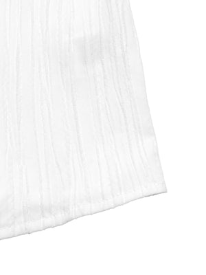 White textured blouse with vertical crinkle detail and crochet trim.