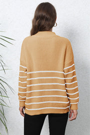Beige striped knit sweater with mock neck and zip detail.