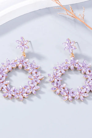 Floral halo drop earrings in pink purple with crystal flowers and gold alloy details.