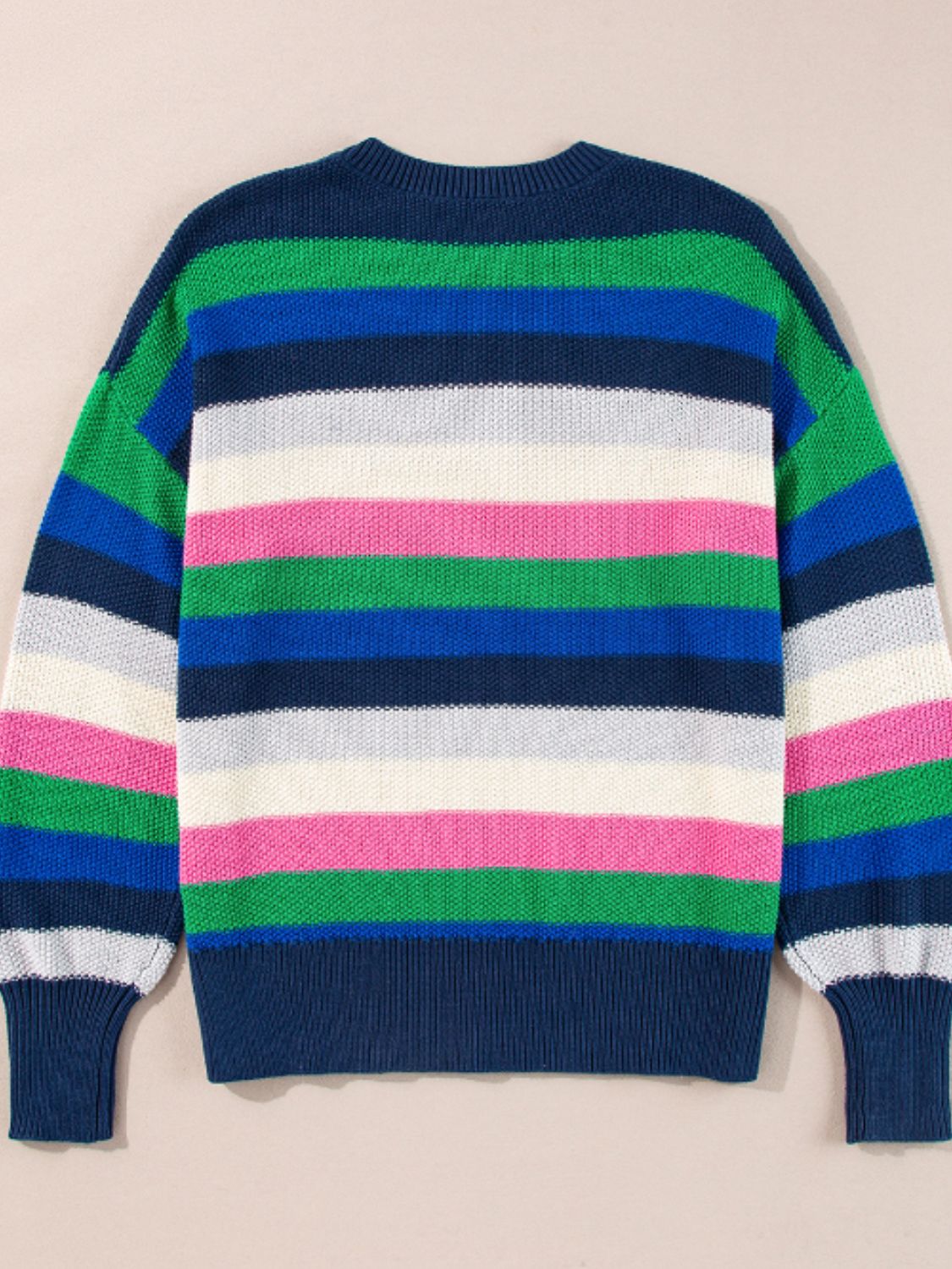 Chunky knit crewneck sweater with bold horizontal stripes in green, blue, white, and pink.