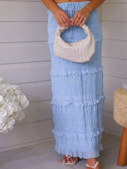 Light blue smocked tiered ruffle maxi skirt with drawstring waist.