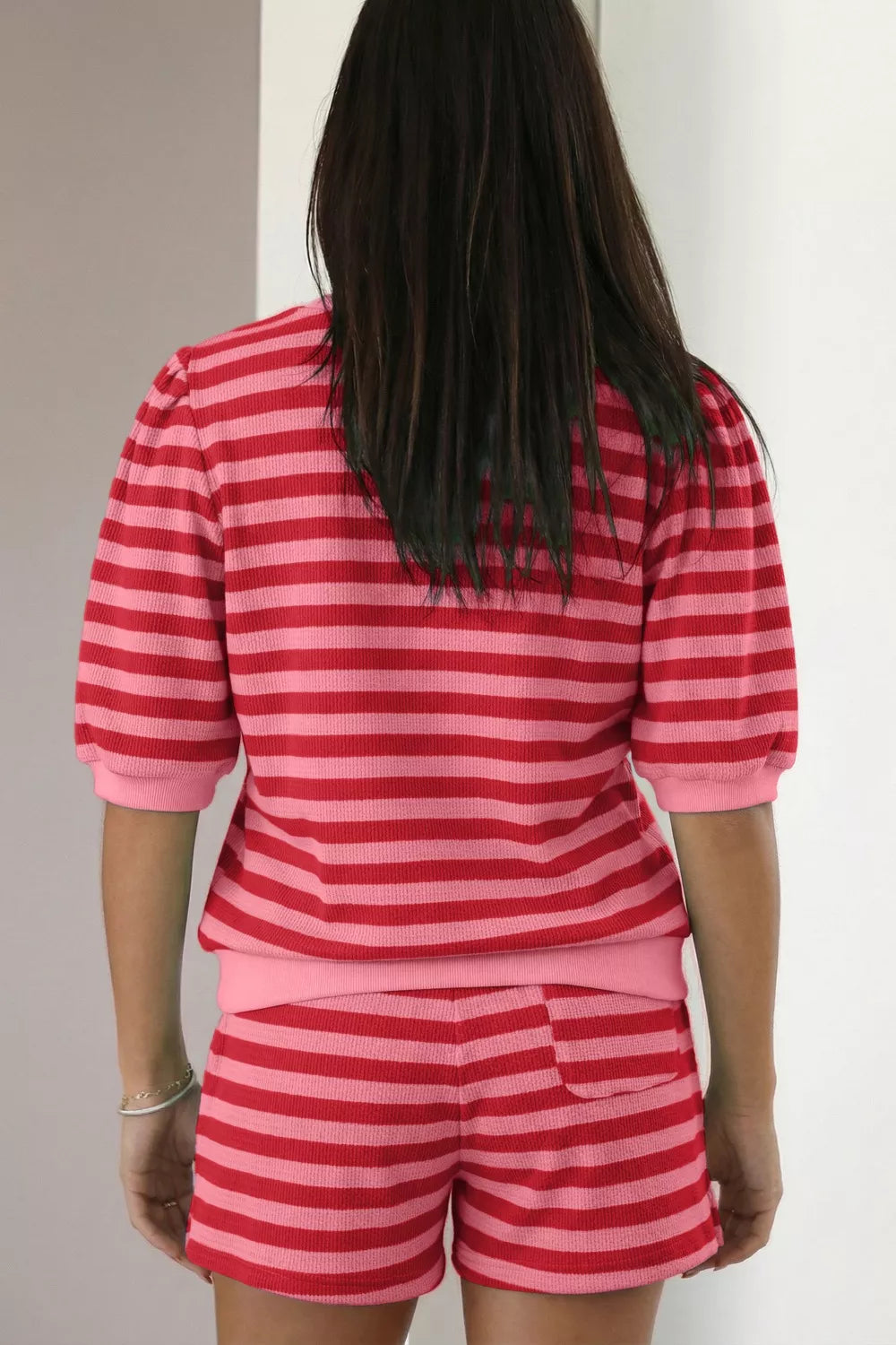 Puffed sleeve striped top and shorts set in strawberry pink.