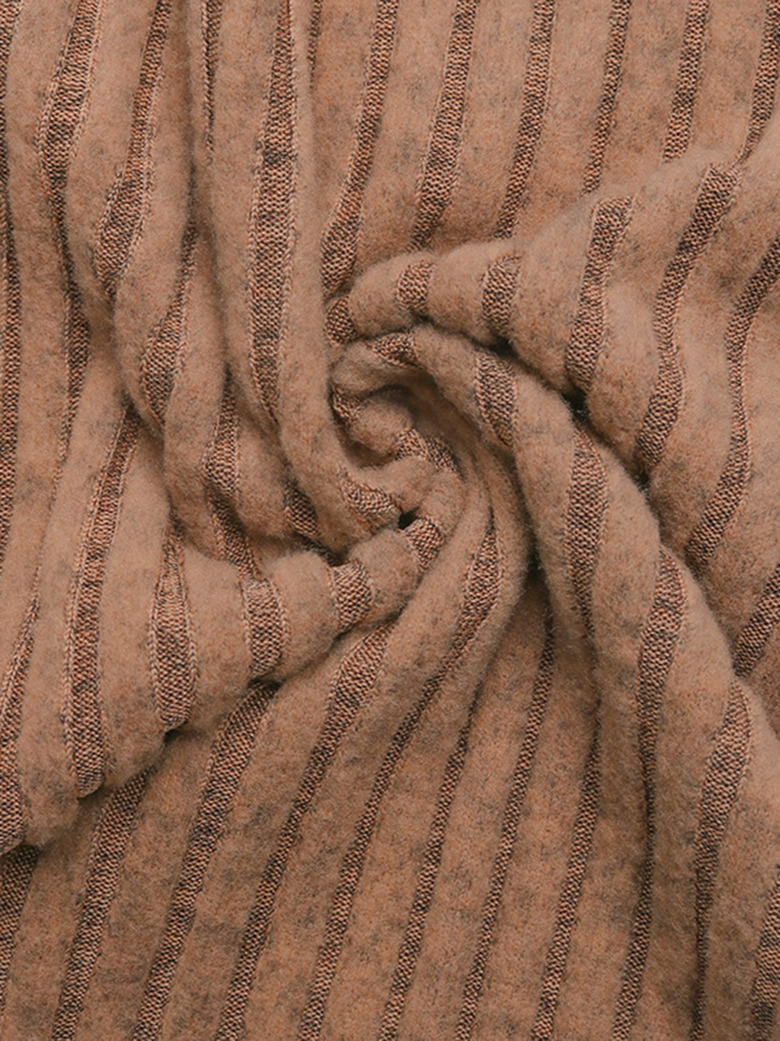 Caramel ribbed knit fabric with vertical stripes, close-up detail