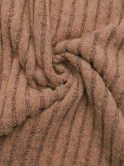 Caramel ribbed knit fabric with vertical stripes, close-up detail